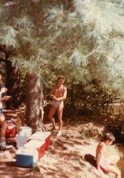 Shirtless member standing under tree at the Dignity/Central PA Picnic – August 1983