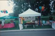Steven Leshner sitting at the Dignity/Central PA booth at Pride Festival of Central PA - July 31, 1994