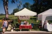 Steven Leshner with two members at the Dignity/Central PA booth at Pride Festival of Central PA - July 30, 1995
