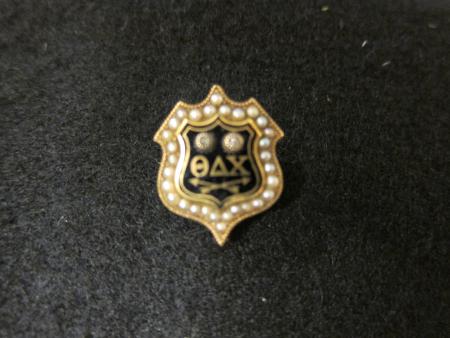 Theta Delta Chi fraternity pin, 1869