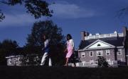 Two students walk, c.1982