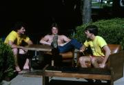 Friends sit outside, c.1982