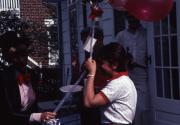 Student receives balloons, c.1982
