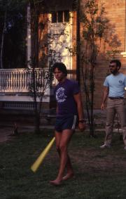 Student holds a baseball bat, c.1982