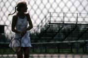 Girl playing tennis, c.1983