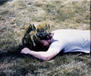 Student lies in the grass, c.1983