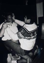 Two students wrestle, c.1983