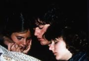 Three friends snuggle, c.1983