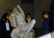 Students pose with a statue, c.1983