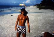 Student walks on the beach, c.1985