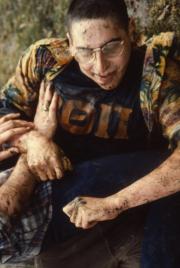 Students wrestle in the mud, c.1985