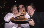 Friends enjoy pizza, c.1986
