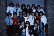 Group smiles in sunglasses and neck ties, c.1986