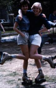 Roller-skaters pose together, c.1986