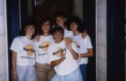 Five students show off matching t-shirts, c.1987