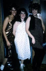 Three students in togas at an event, c.1990
