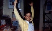 Student raises his arms, c.1991