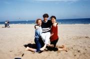 Three friends have fun on the beach, c.1991