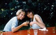 Two students enjoy a drink outside, c.1991