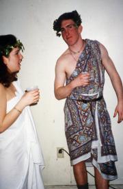 Two students in togas talk, c.1995
