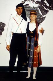 Two individuals dressed in traditional costume, c.1995