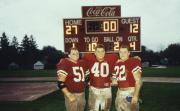 Three football players after a game, c.1996
