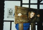 Student is put in the stocks, c.1996