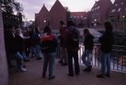 Students stand along the River Wensum, 1995