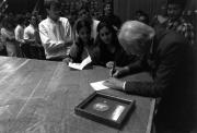 Francis Crick signs Priestley Award programs, 1988