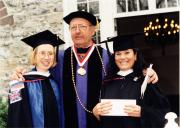 President Fritschler with two students at Commencement, 1997
