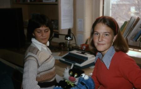 Students sit at a desk, c.1982
