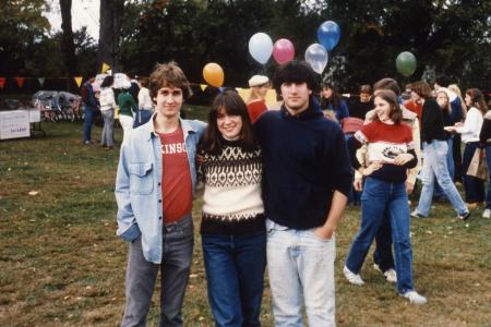 Three students smile, c.1984