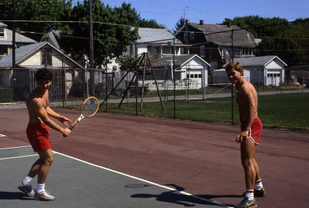 Two students play tennis, c.1985