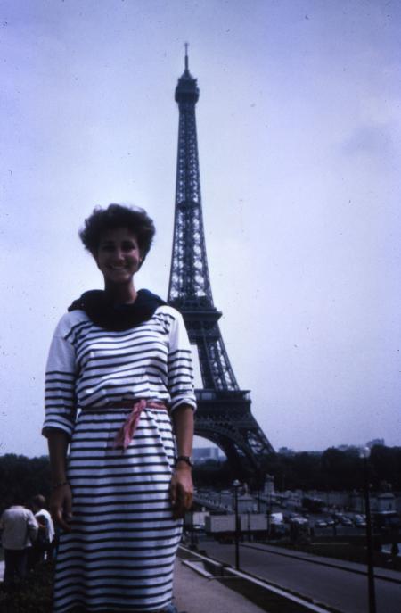 Student poses with Eiffel Tower, c.1986