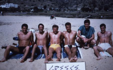 Students lounge on a beach, c.1986