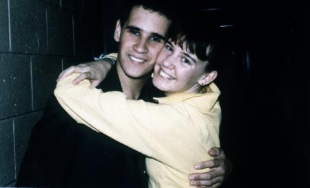 Two students hug, 1987