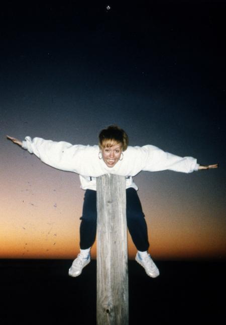 Student balances on a pole, c.1990
