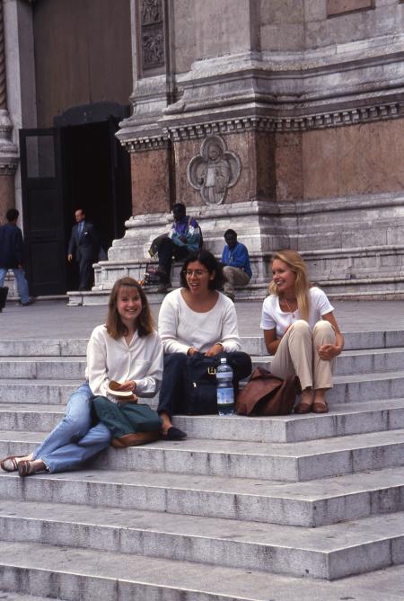 Students sit on the steps of San Petronio, 1994