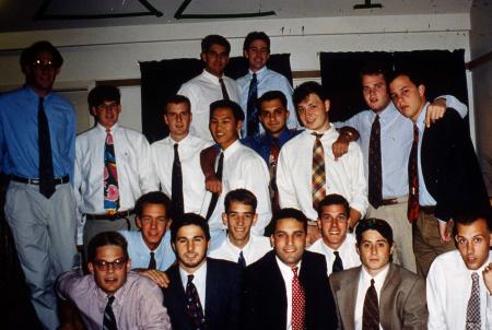 Fraternity members in formal attire, c.1995