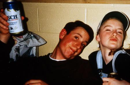 Two students share a drink and a smile, c.1995