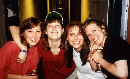 Four friends at a social event, c.1995