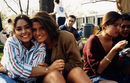 Students sit outside on Morgan field, c.1995
