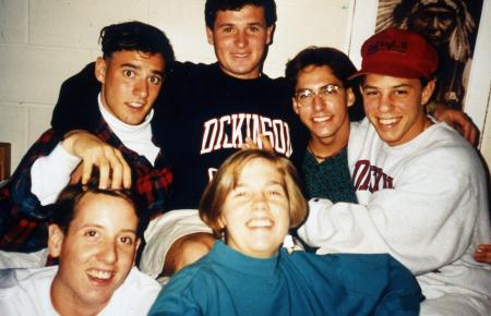 Friends laugh together in a dorm, c.1995