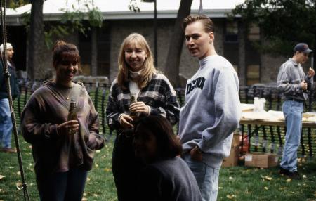 Students chat at an event, c.1996