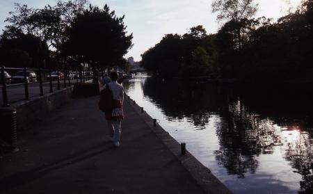 Student walks along River Wensum, 1995