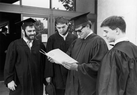 Students outside the Kline Center at Commencement, 1990