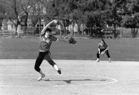 Softball player pitches, 1989