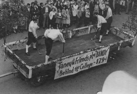 Taney and Friends Play '"Bandy" Behind the College - 1794 Float, 1948
