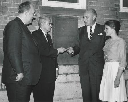 President Rubendall returns key to Metzger Trustees, 1963