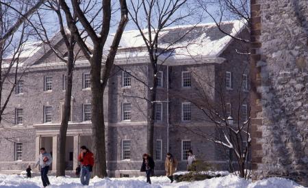 Students walking through the academic quad in the snow, 1988